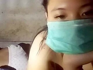 Asian girl with big tits dances seductively in gogo club