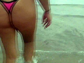 Amateur couple gropes each other in public outdoor setting