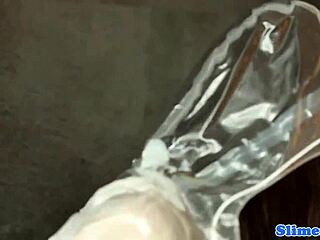 babe masturbates while watching a glory hole blowjob.