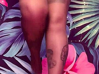 She teases in pantyhose and latex dress.