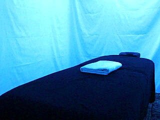 Gigi Breeze undergoes a blacklight massage focusing on natural tits