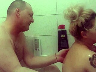 European couple enjoys a steamy shower together