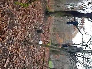 in the forest, she masturbates under the trees