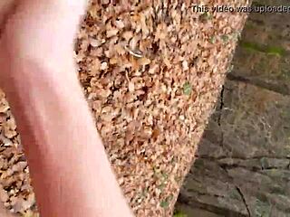 in the forest, she masturbates under the trees