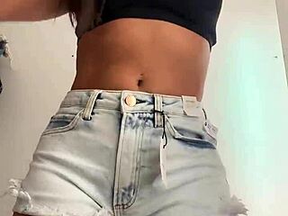 Wife Trying Shorts In Mall Store