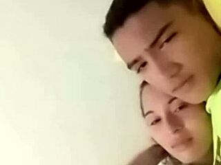 A sexy couple shares intimate moments in bed.