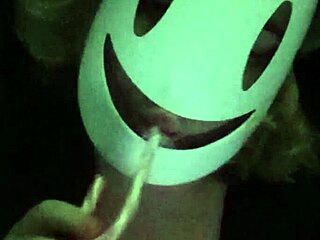 petite girl softly touching her breasts under black shirt. and bra gently