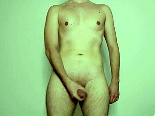 Young amateur masturbates cock during solo webcam session