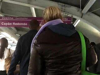 Touching the brown nylon jacket of chubby girl on street. What’s hiding underneath?