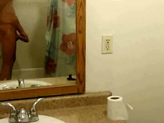 girl masturbates in the bath