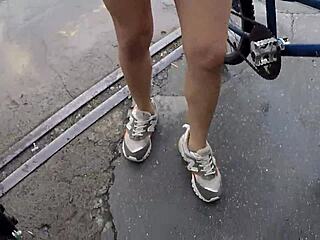 two hotties cycle without panties in rain!