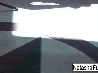 Brunette pornstar Natasha enjoys intense alone time masturbating her big tits and pussy nude