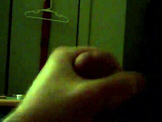 A solo performance of self-pleasure by a man with an impressive cock