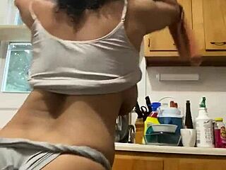 Latina milf having fun doing the dishes