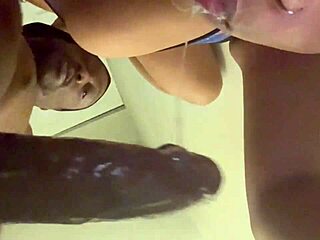 that mixed girl is sucking that big black cock hard