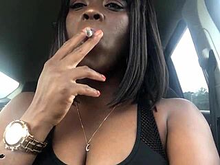 Black goddess dominates in car smoking porn