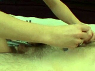 A man brings a brunette home to degrade him and have sex with him using a dildo.