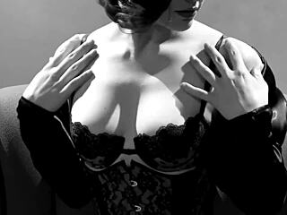 bobbi’s solo play in corset and stockings gets steamy fast.