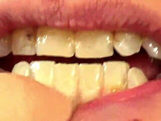 Close up of Fifi Foxx eating gummy bears.