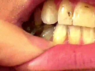 Close up of Fifi Foxx eating gummy bears.