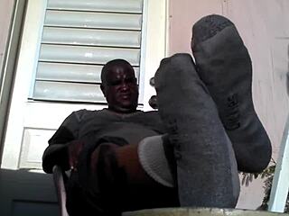 Black master's big feet after work, craving a slave