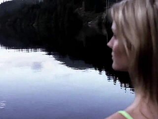 Blonde girl swims in bikini