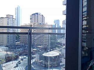 hot gamer girl flashes from balcony outdoors