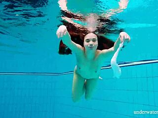 Nina Mohnatka flaunts hairy tight pussy underwater