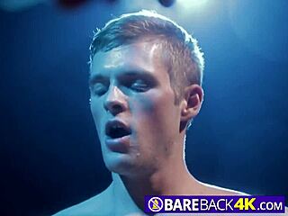 two muscular bodybuilders in bareback bondage threesome