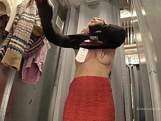Outdoor shop fitting room espionage in a mall