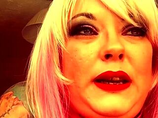 Chubby British domme Tina Nua smokes a King Size cigarette
