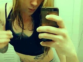 Pretty shemale in miniskirt masturbates and shows her small penis