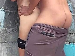 Feeling the passion against the wall with my brunette neighbor, her brown eyes full of desire.