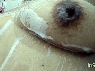 latina babe plays with dildo in the shower