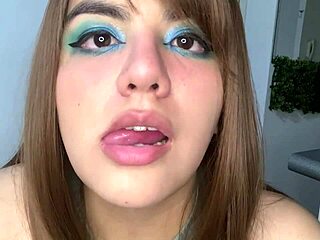 Big beautiful woman eats gummy bears in her bedroom