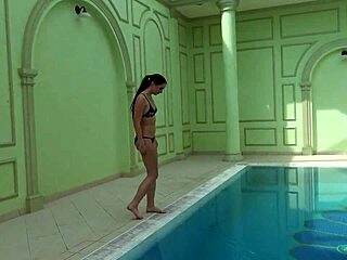 Kittina Ivory strips in the public pool and shows her ass and big tits
