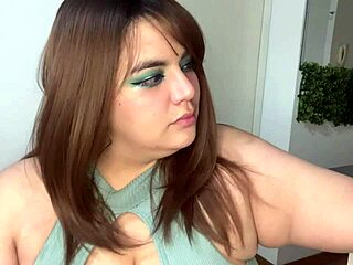 Big beautiful woman eats gummy bears in her bedroom