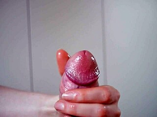Discover the Slow Lube Technique on a Massive Cock for Intense Handjob Pleasure
