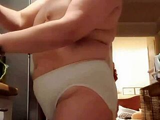 First time homemade video of my wife in big panties in the kitchen