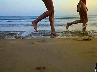 Four girlfriends licking shaved pussies on the beach