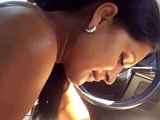 Hot brunette MILF giving a great blowjob in the car
