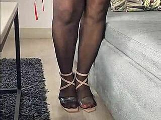 Kenia's tease video in black stockings and red dress