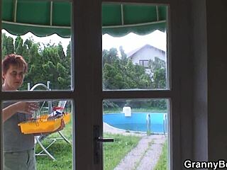 An elderly woman next door gives a blowjob and rides a big cock