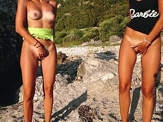 Lesbian teens finger pussies on public beach