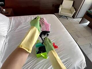 sage roux performs in fishnet suit on stage