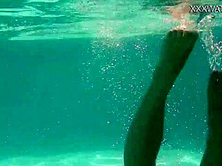 Naked petite brunette masturbates by pool