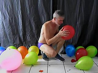 Horny Gay Dilf Richard Lennox Masturbates with Balloon and Monster Cock