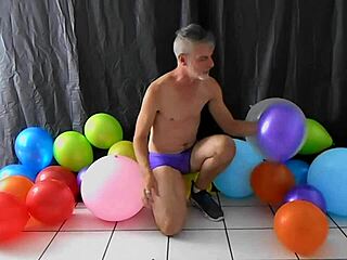 Horny Gay Dilf Richard Lennox Masturbates with Balloon and Monster Cock
