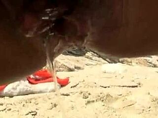 Public beach action with a horny MILF and a monster cock
