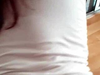 Amateur couple has rough sex on a table in the living room